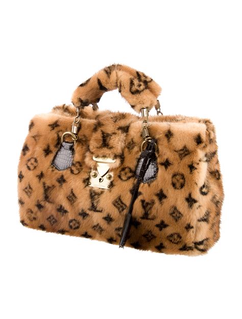 louis vuitton mink lock bag